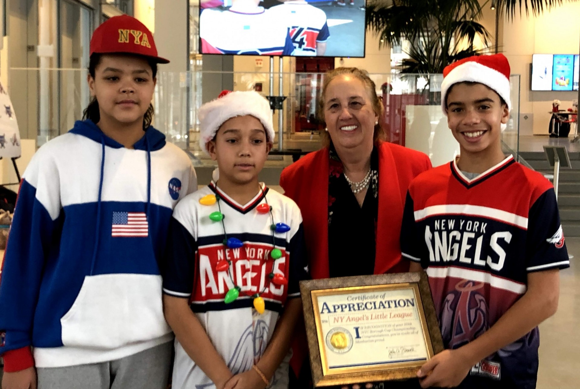 Manhattan Borough President Gale Brewer with 3 Little League players