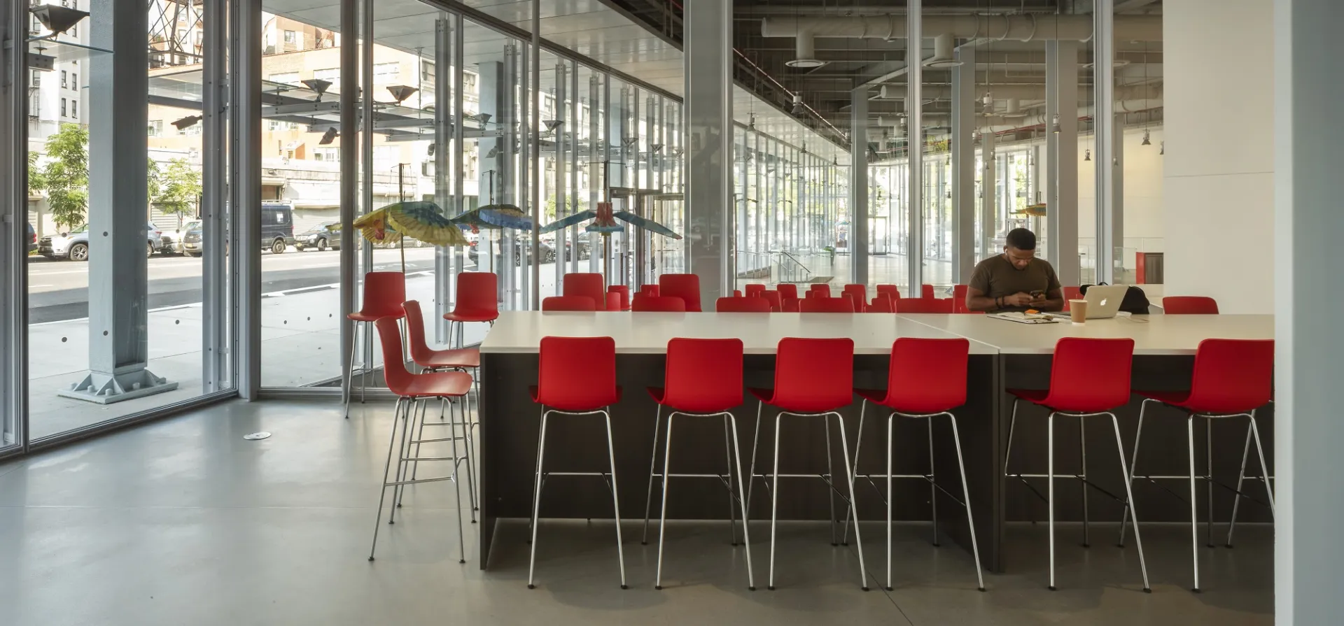 Communal high-top conference table in The Forum's atrium