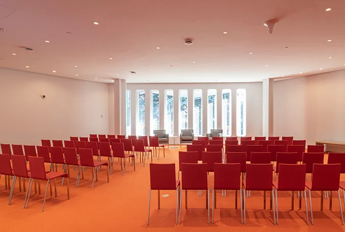 The Forum's Foyer with chairs arranged theater style