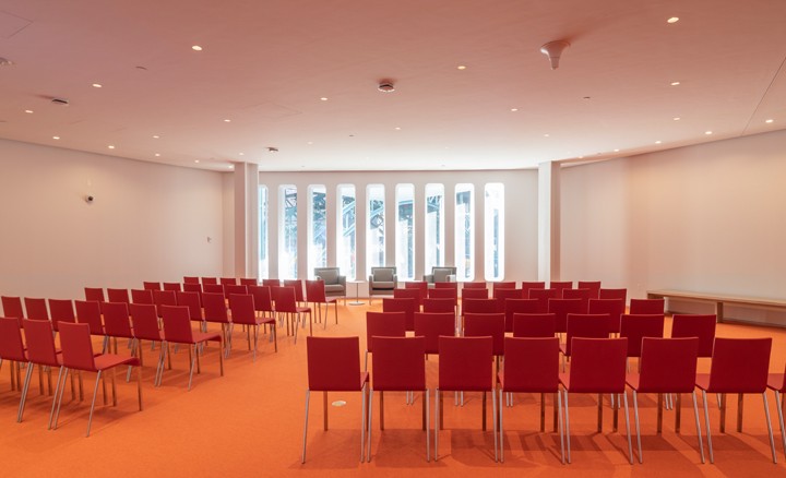 The Foyer: Theatre Style Setup (110)* Foyer room with chairs facing the windows in theatre style formation