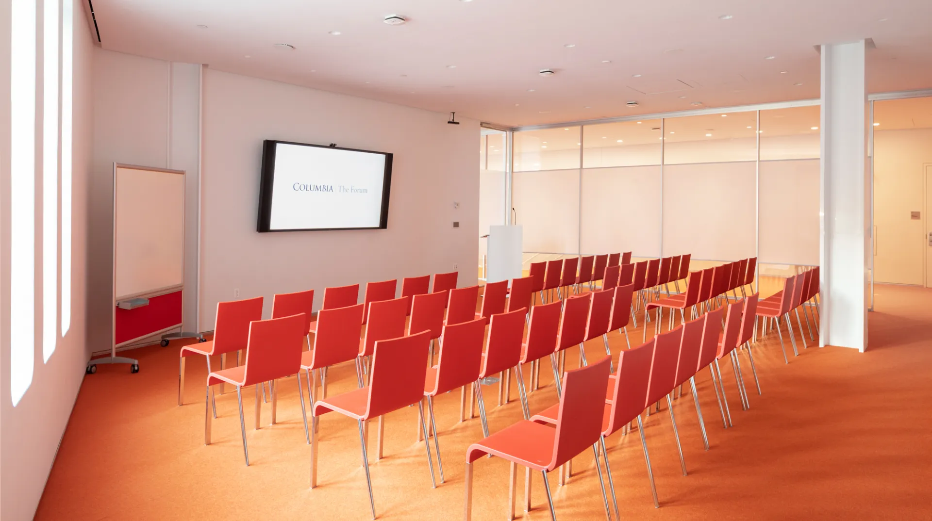 Meeting Room 315 setup theatre-style with chairs in four rows across the room
